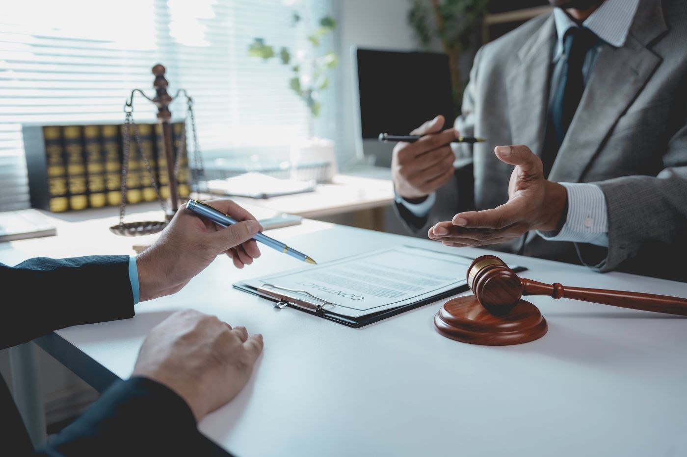 Businessman discussing contract with attorney