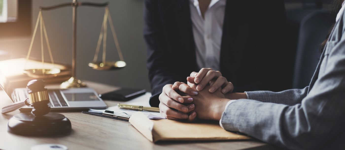 Attorney giving legal consultation and trust commitment to client