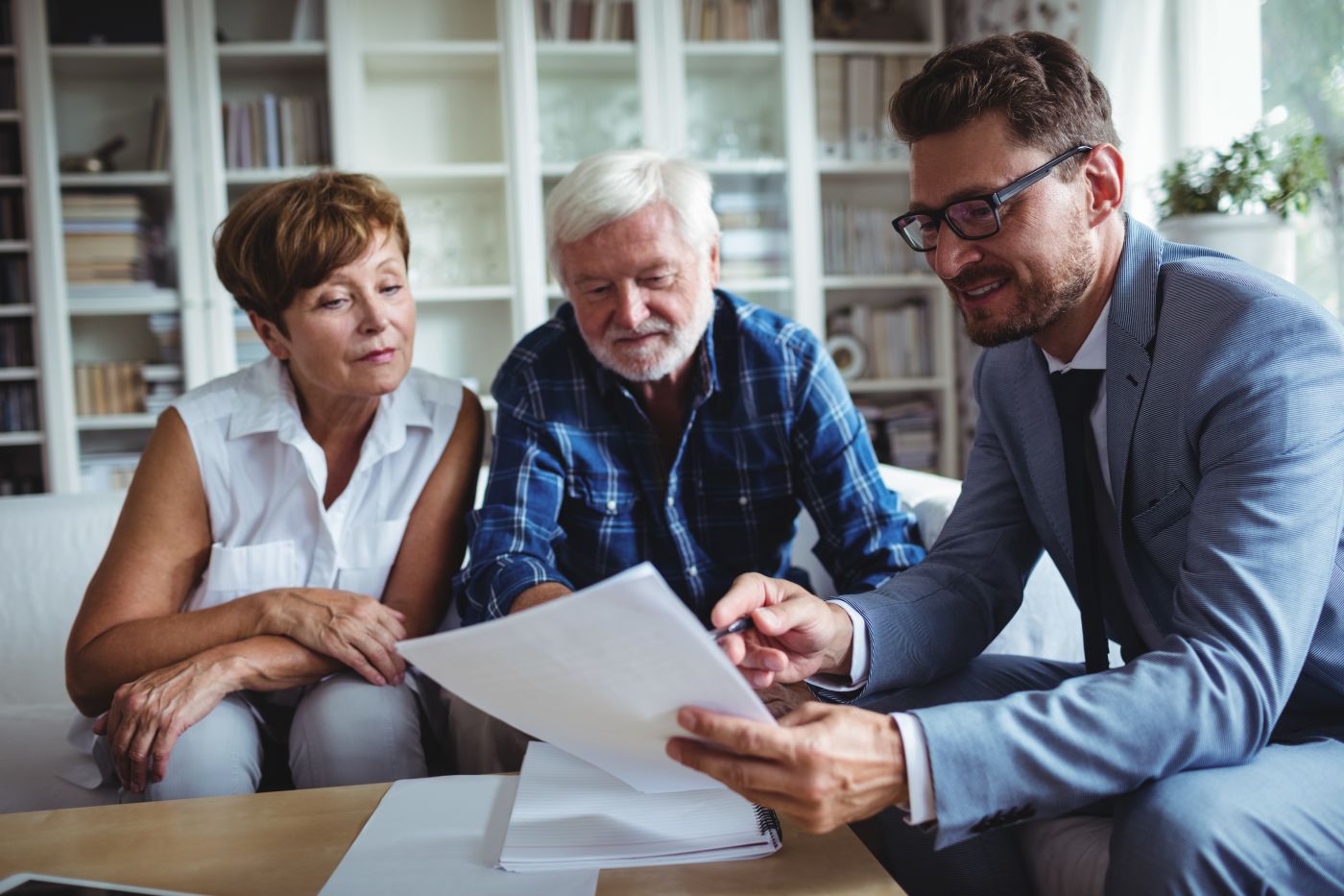 Senior couples consulting with professional for estate planning