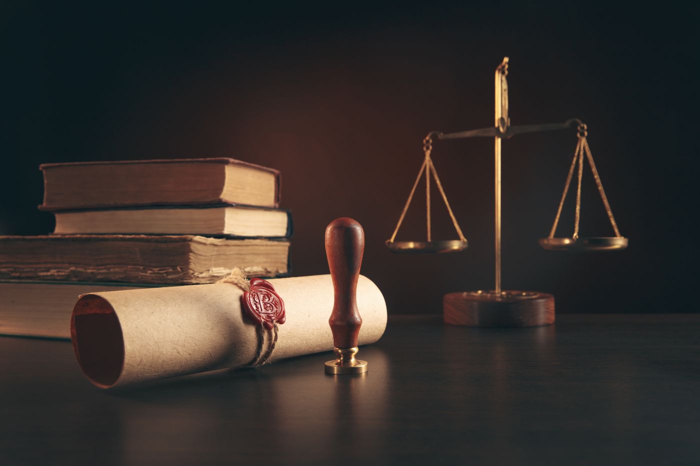 Last will, Notary Stamp and Scale of Justice in table