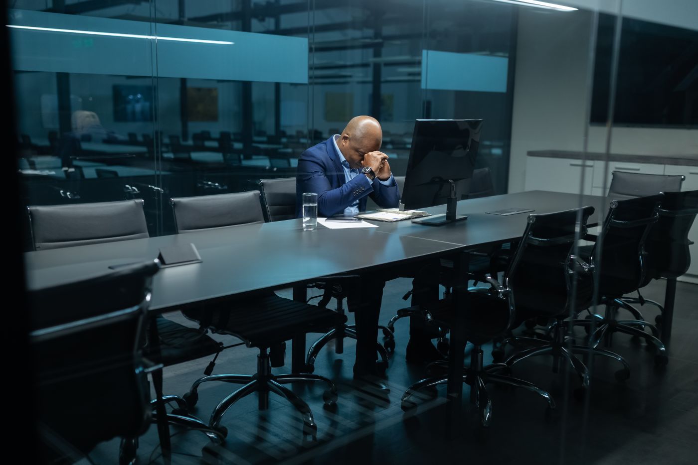 Businessman sitting alone in a meeting room