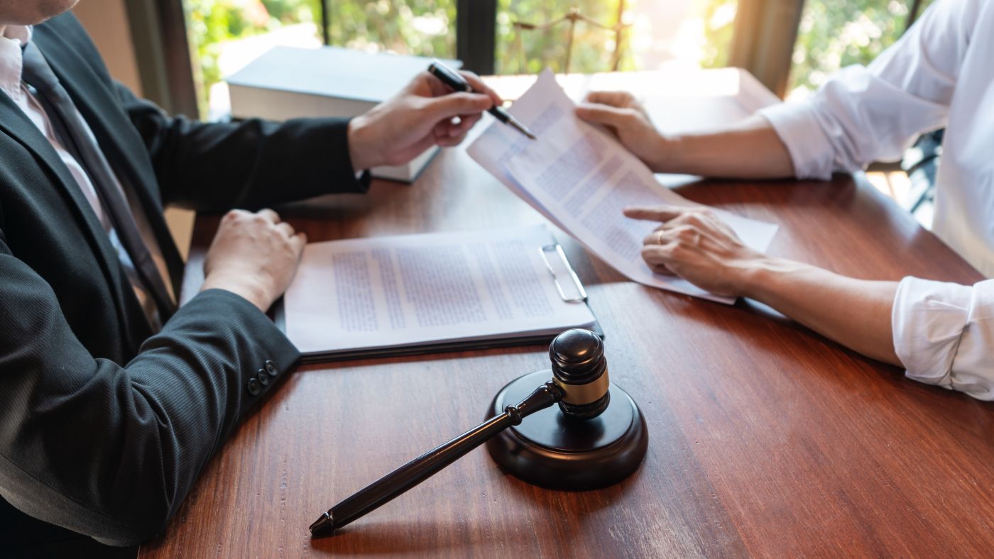 Attorney providing legal consultation to client