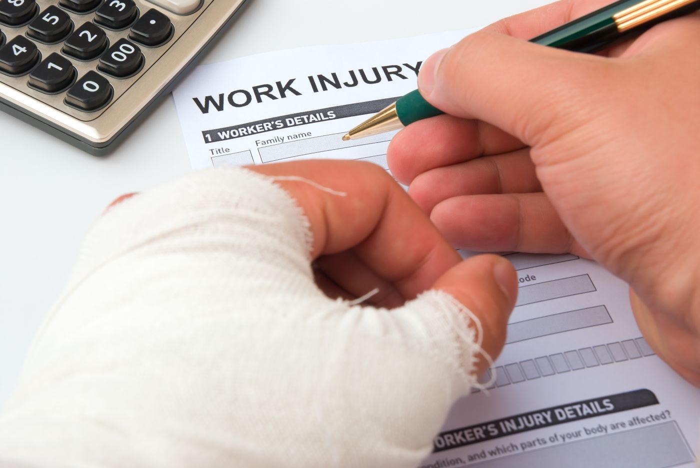 Injured worker filling work injury form