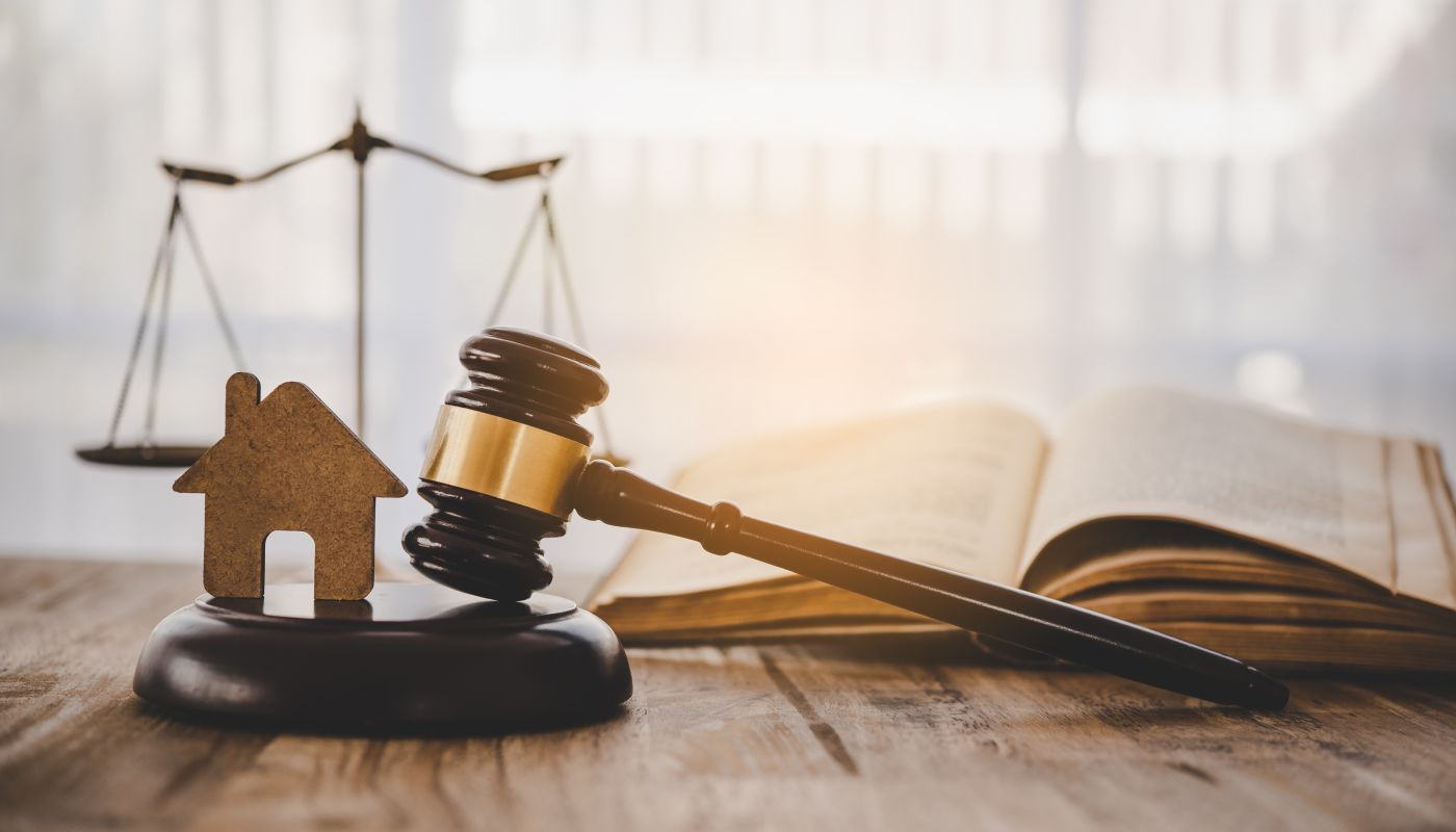 Gavel, Scale of Justice and House model