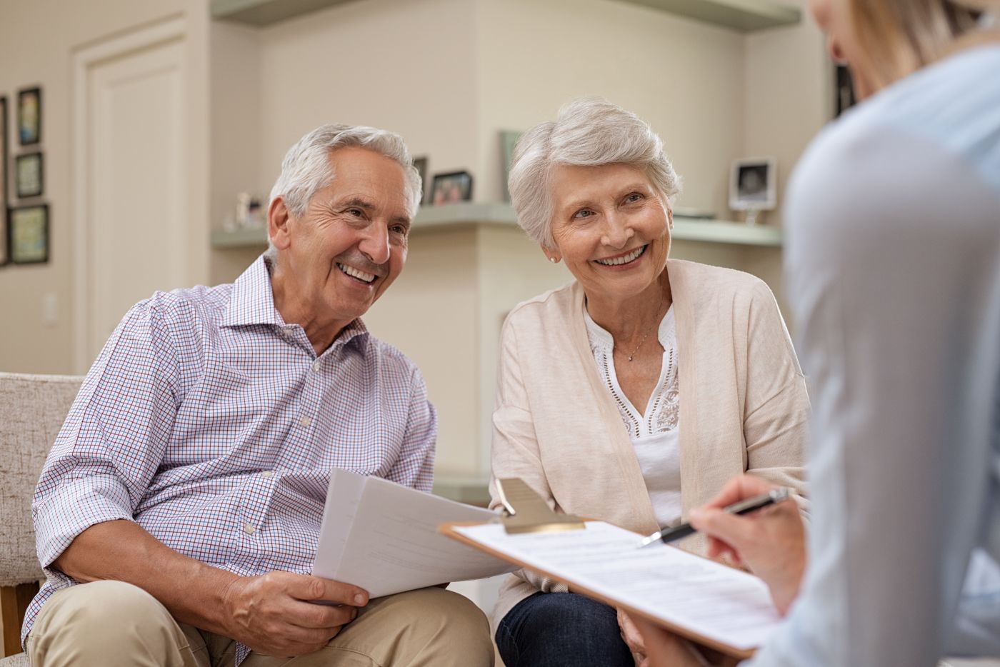 Senior couple consulting with attorney