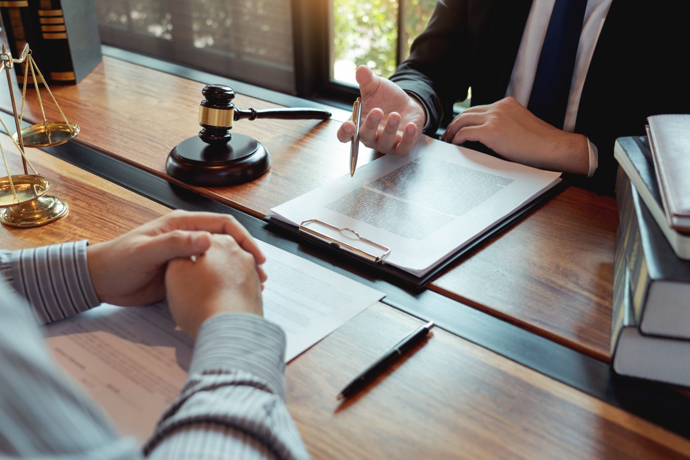 Businessman consulting with attorney