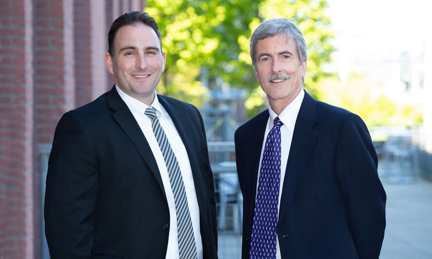 Attorneys Phillip A. Curiale and Charles R. Hostnik