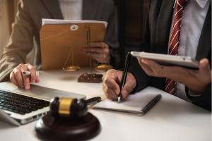 Attorneys working together on laptop