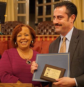 Jaime Lathrop receiving an award
