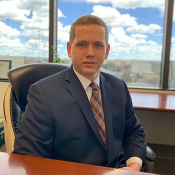 Lawrence at his desk