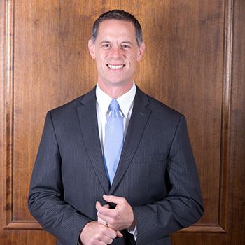 Schrameck smiling