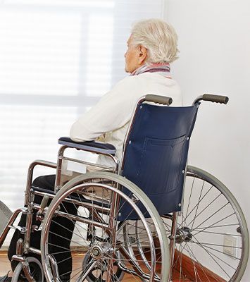 Lonely senior woman in wheelchair