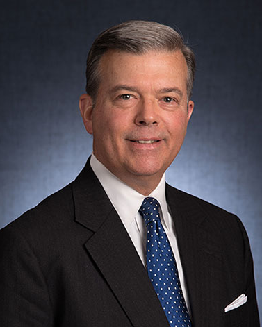 MARTIN E. WOLF