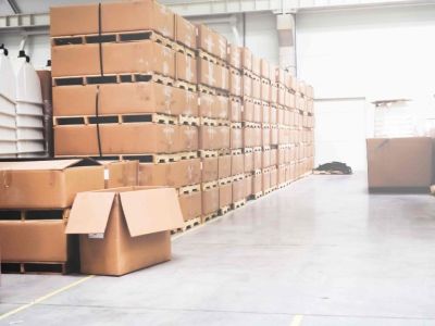 Rows of cardboard boxes stacked on top of each other