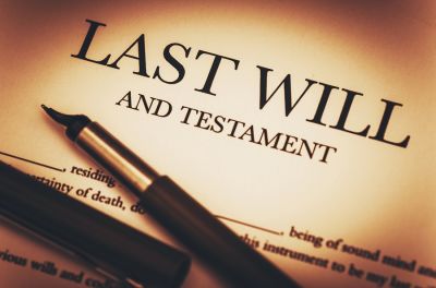 Last Will and Testamend document with pens laid on top