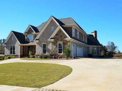 Large house with a half circle driveway