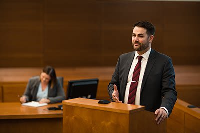 Attorney Stephen Wolfe Standing at a Court Podium