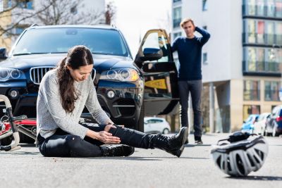 car accident involving female bicyclist 