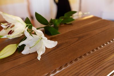 Flowers on top of casket