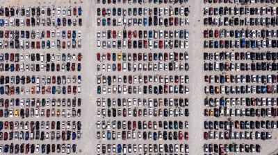 View from above of cars parked in a large lot