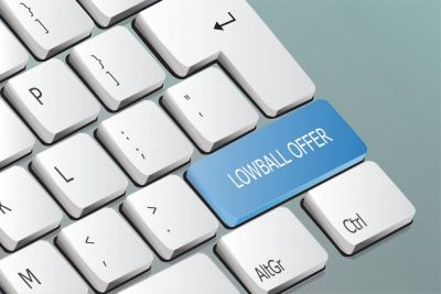 Keyboard with a blue key labeled "Lowball Offer"