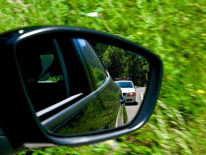 Photo by 422737 https://pixabay.com/users/422737-422737/ on Pixabay https://pixabay.com/photos/tracking-police-rearview-mirror-802744/