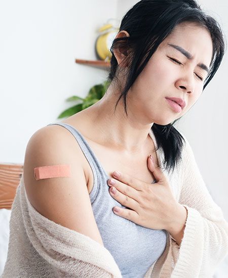 Women feeling sick after vaccination