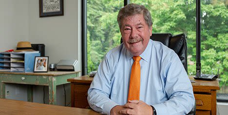 Attorney Mike Gillett stting in his office