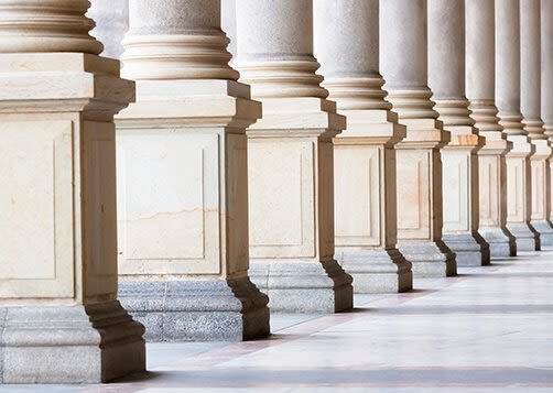 row of large stone columns