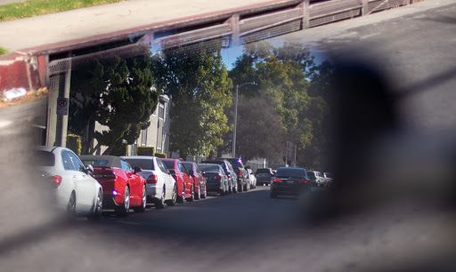 cars in a rearview mirror