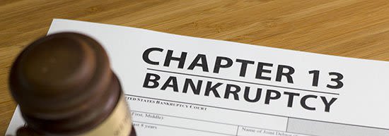 Gavel resting on chapter 13 bankruptcy documents