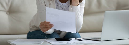 Woman looking over documents