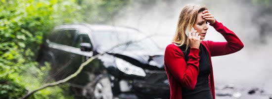 Person calling an attorney after an accident