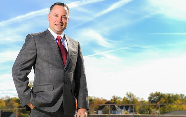 Attorney Jack Maliki in front of a blue sky