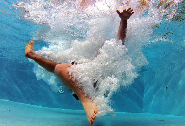 Person falling into pool