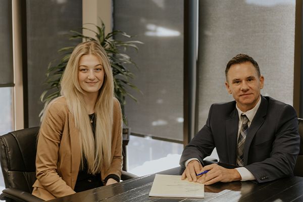 Attorney and staff in conference room