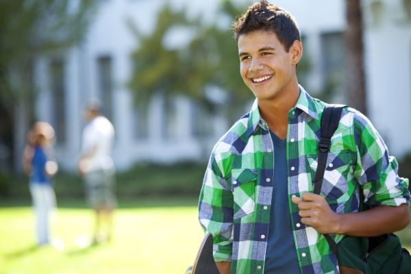 Young man with a backpack over his shoulder