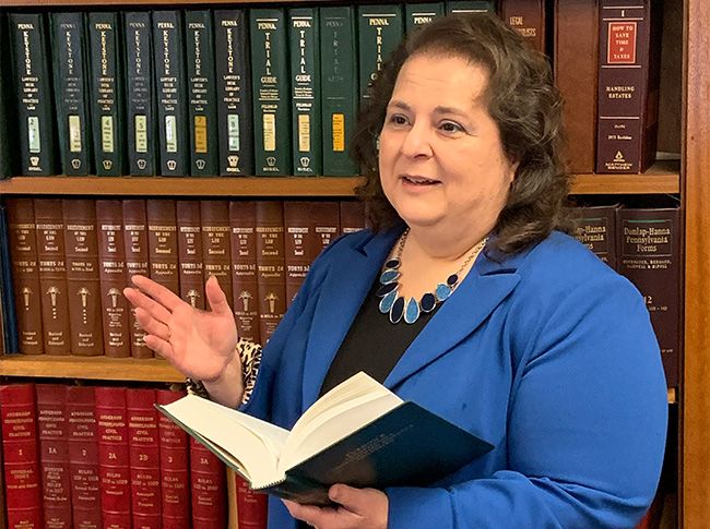 Rosana with book