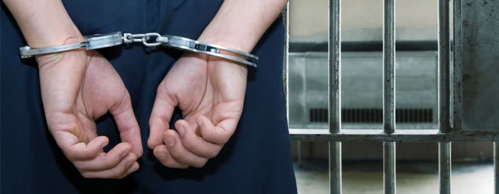 Person in handcuffs
