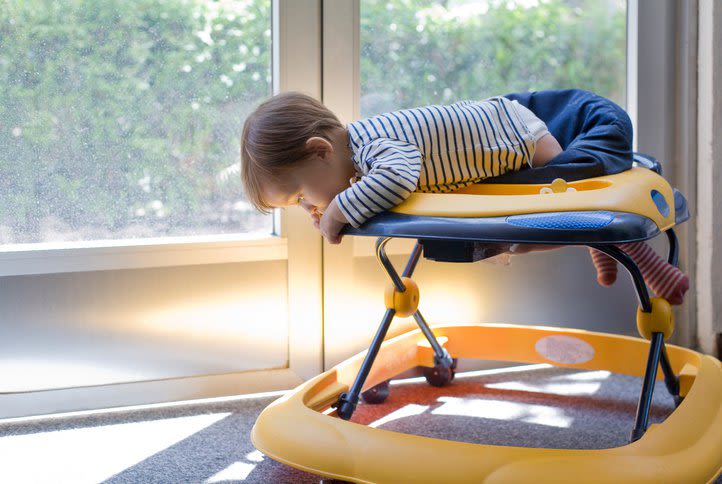 Baby climbing on baby walker