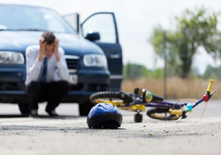 Man in distress after hitting a bike rider