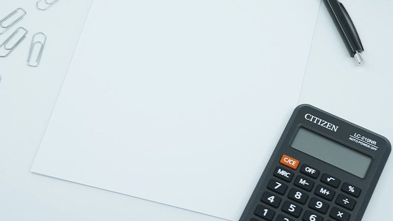 paper, calculator, and pen
