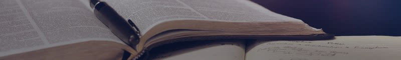 Open book with pen