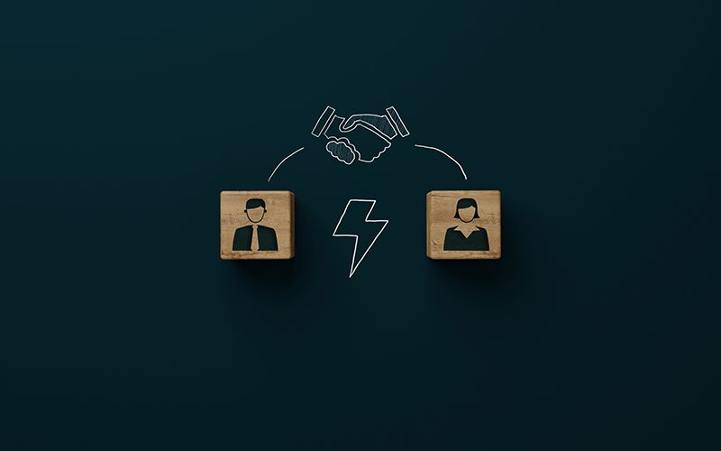 Icon of man, woman, lightning bolt and shaking hands
