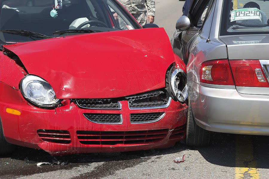 red car crash into silver car
