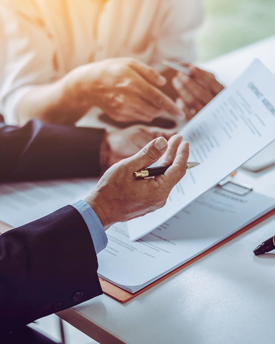 lawyers discussing and sign a contract