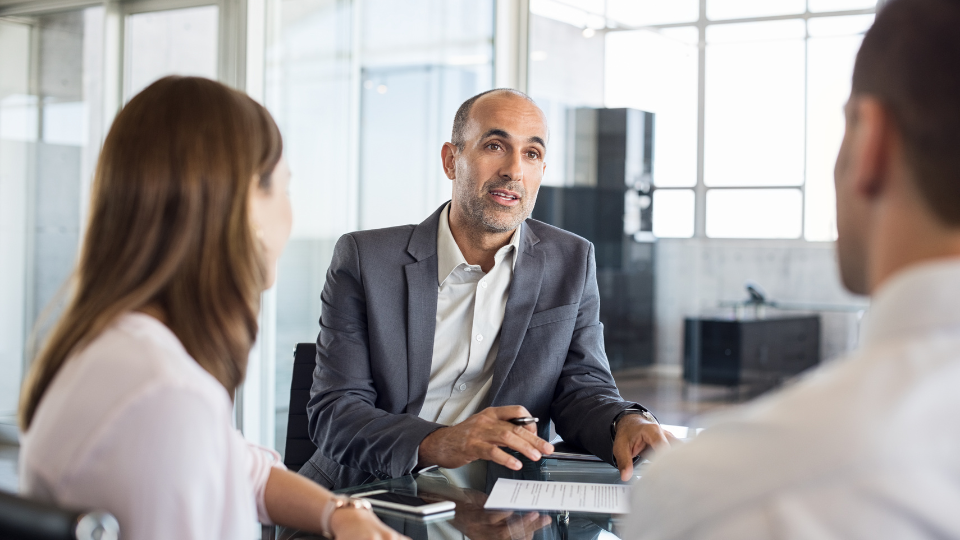 A lawyer meeting with clients
