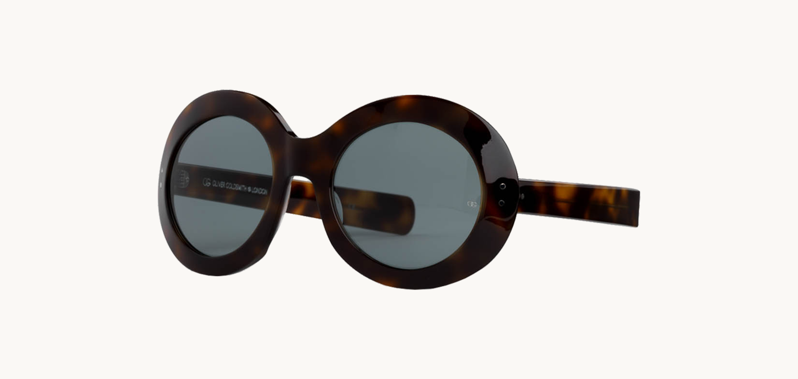 Lunettes de soleil Koko - , Oliver Goldsmith, Ronde Papillon, de couleur Ecaille foncée Marron.