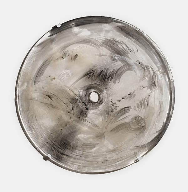 Gong Piece, 2024; glass, rondel, chalk, charcoal, pigment, dust, metal; 24 x 22 x 1 inches