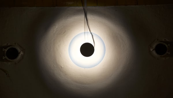 The Diver,2018, milk paint, glass (rondels), borosilicate, wood, concrete, dirt, light fixture, TARP, Altadena, CA. Rondel by Max Grossman, KT Glassworks. Metalwork by Charles Mathis